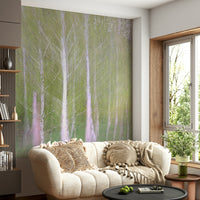 The mural is installed on a large wall behind a modern sofa.

