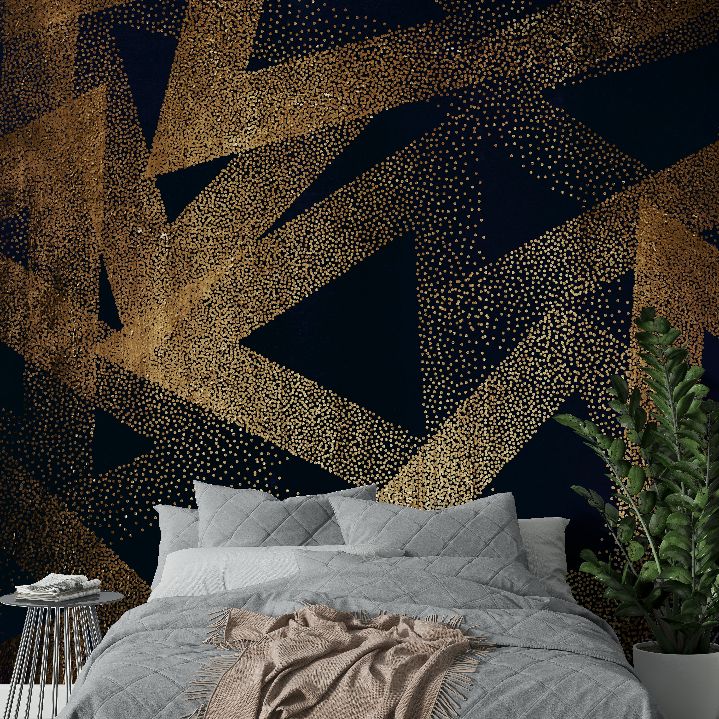 Silhouetted figures dancing in a wall mural.

