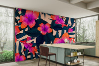 Vibrant exotic flowers in shades of pink, red, and orange.

