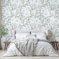 Design featuring graceful hummingbirds and delicate blossoms.

