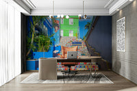 Wall mural showing a vibrant staircase with colorful tiles.

