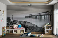 The style is photographic, with a focus on light, shadow, and texture in grayscale.
