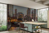 Features a panoramic view of the London skyline at twilight or dusk.
