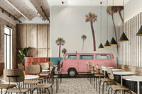 classic pink van with surfboard

