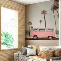 vintage pink camper van on the beach

