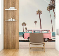 beach scene with a pink vintage bus

