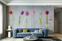 A high-resolution photo-realistic wall mural of tulips in clear glass bottles.

