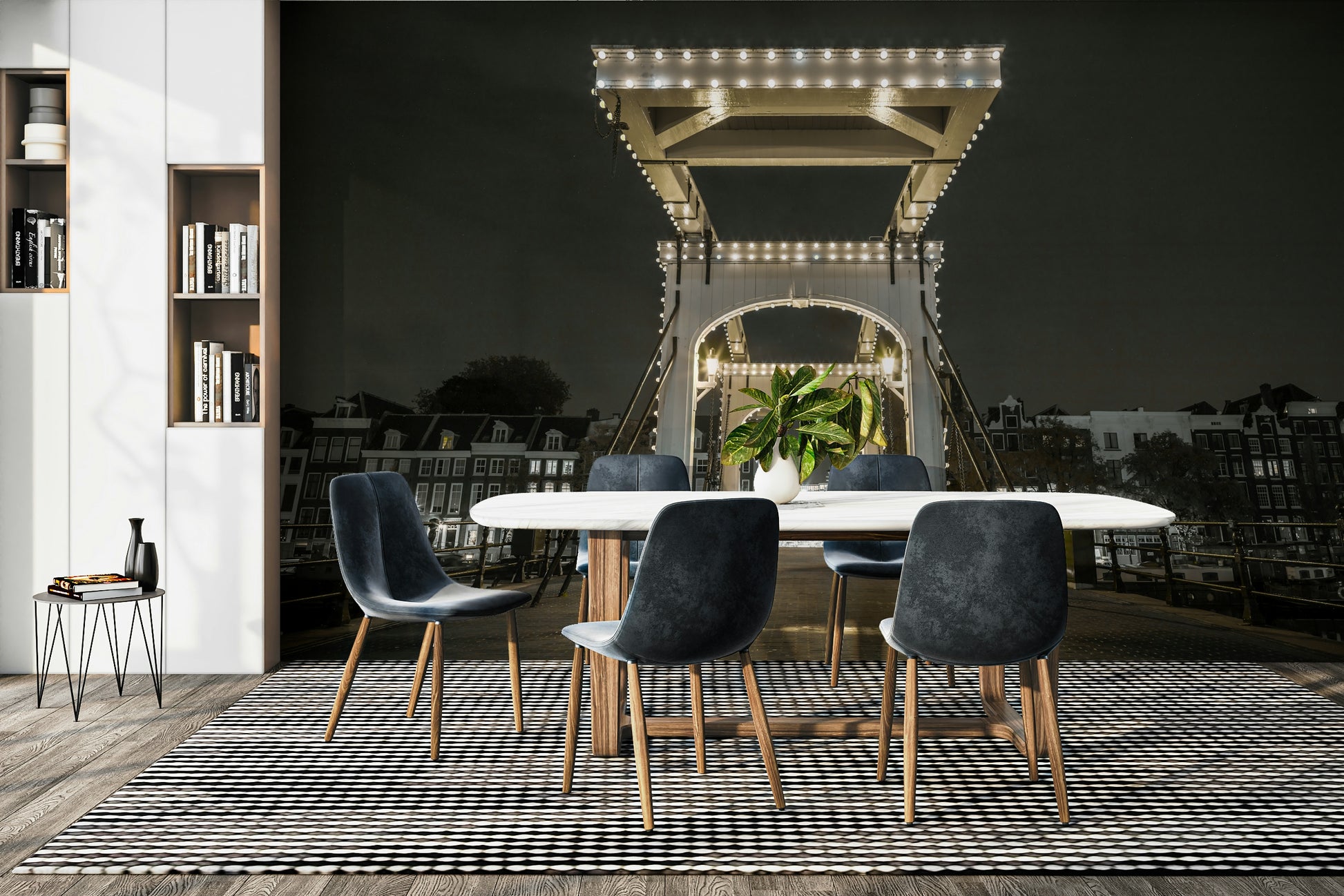 The image shows a classic, white drawbridge illuminated by many small lights.

