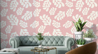 The design features various types of leaves and foliage in gentle pink shades.

