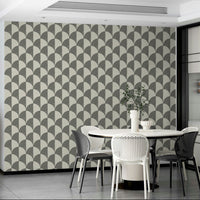 The wallpaper is applied seamlessly, giving the wall a uniform, high-end look.

