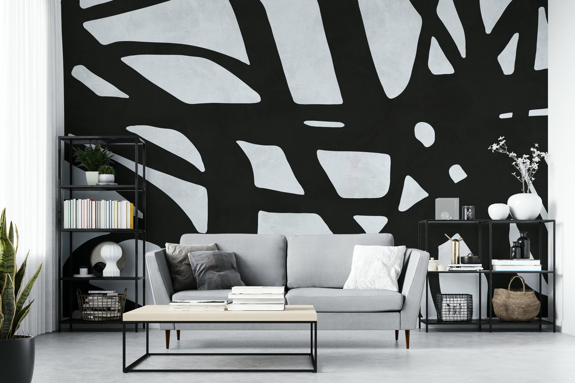 The room feels dramatic and chic due to the dark, elegant design.

