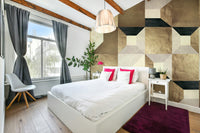 A close-up view of the detailed gilded lines and shapes.

