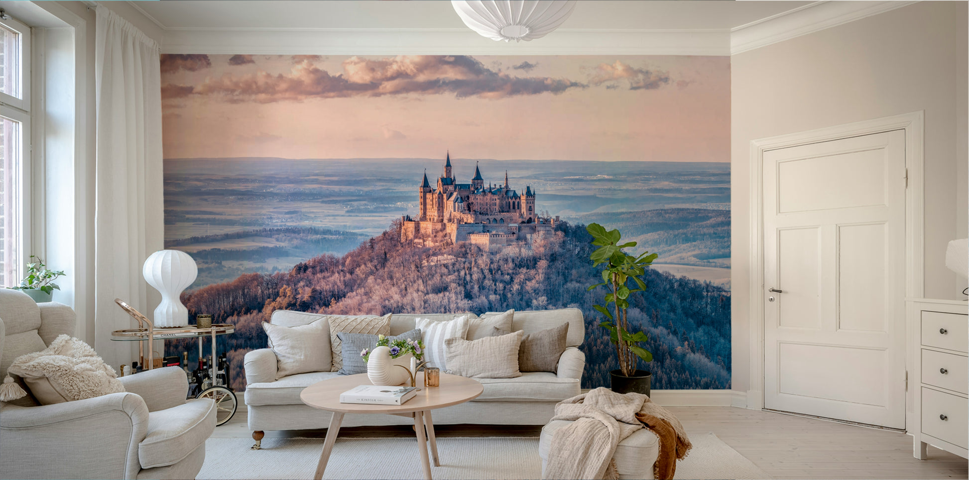 The image shows majestic mountains or platforms reaching into the clouds.

