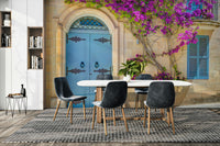 The leaves are a lush green, contrasting with the bright flowers.

