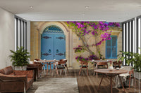 The room feels warm and open, like looking out onto a garden.

