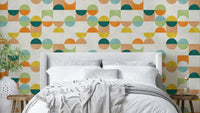 A mid-century modern wall mural with a repeating pattern of geometric shapes.


