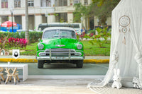 The mural gives a feeling of being in Havana.

