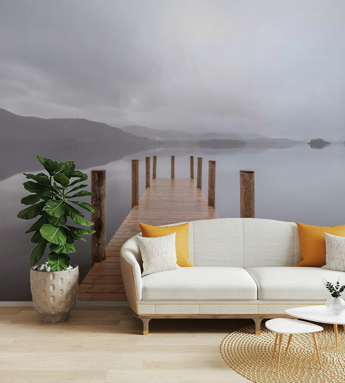 The pier stretches out over calm water.

