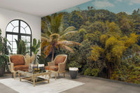 The foliage is dense with various shades of green and yellow.

