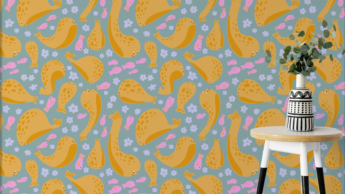 The image shows a pattern of playful whales.

