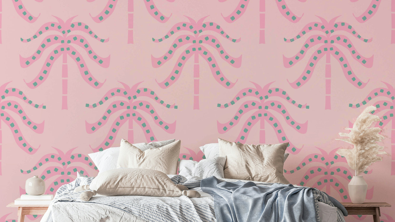 A wall mural of a tropical palm leaf pattern.

