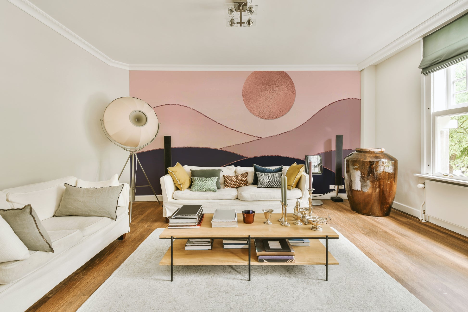 The colors are soft, muted tones of rose gold, pink, and white.

