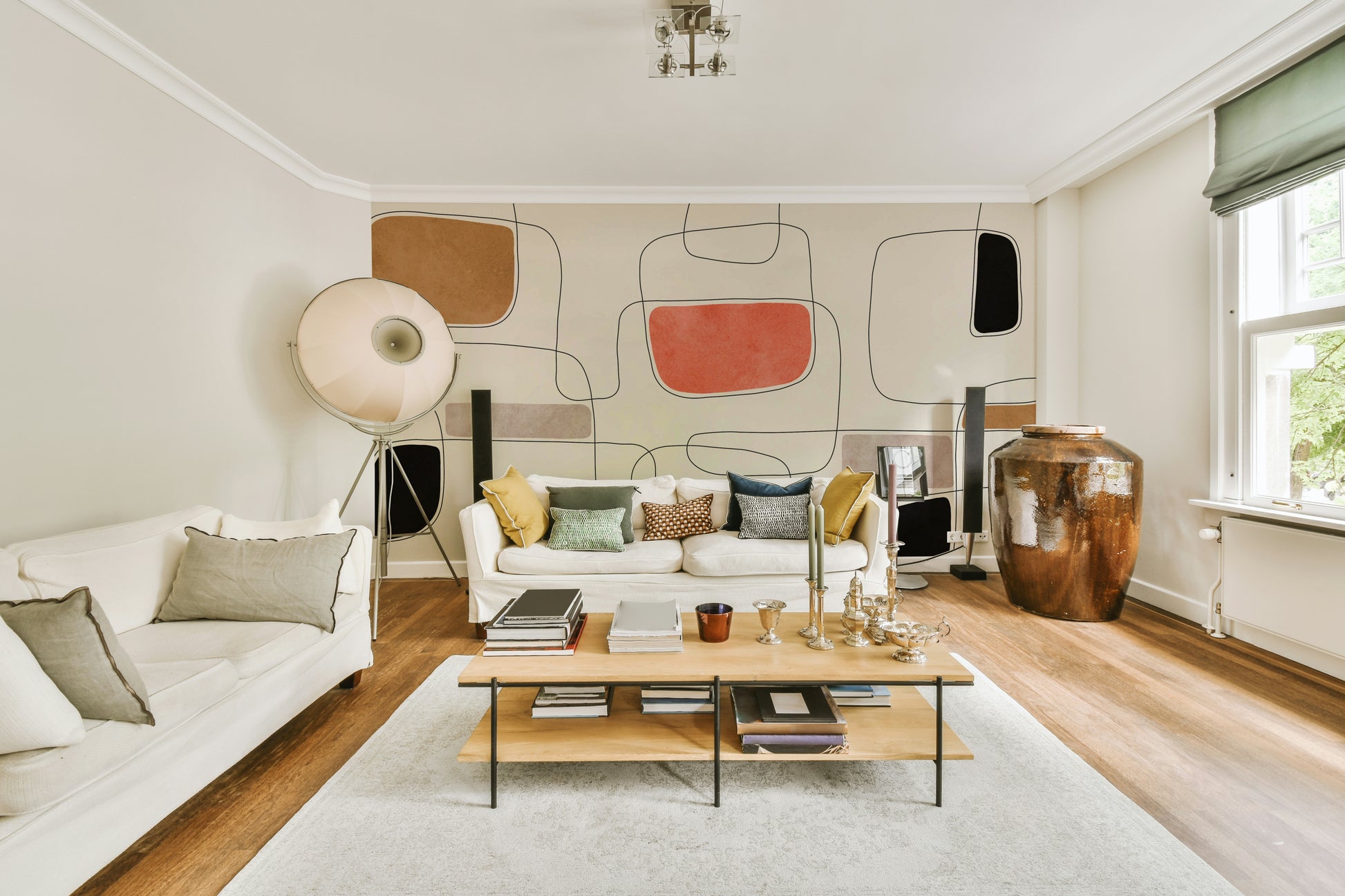 The mural extends across the entire wall, creating a clean backdrop.

