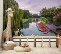 A wall mural featuring a peaceful, natural river scene.


