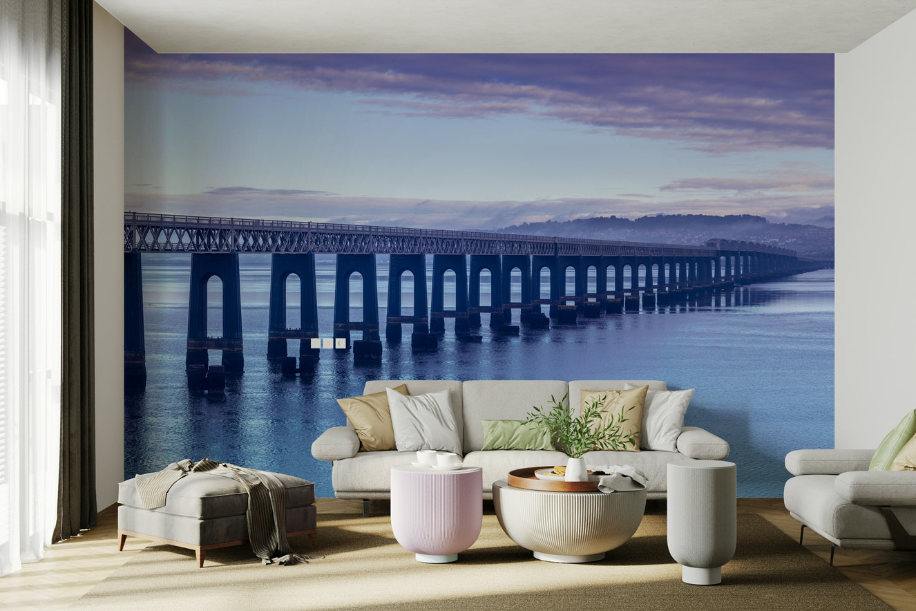 Wall mural of a serene coastline at sunrise.

