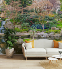 The mural shows a Japanese garden with a pond and bridge.

