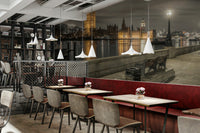 The wall art combines historical architecture with a modern city.

