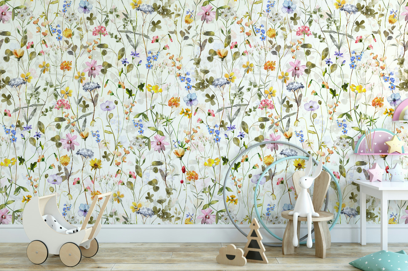 Wall mural with a watercolor wildflower meadow.

