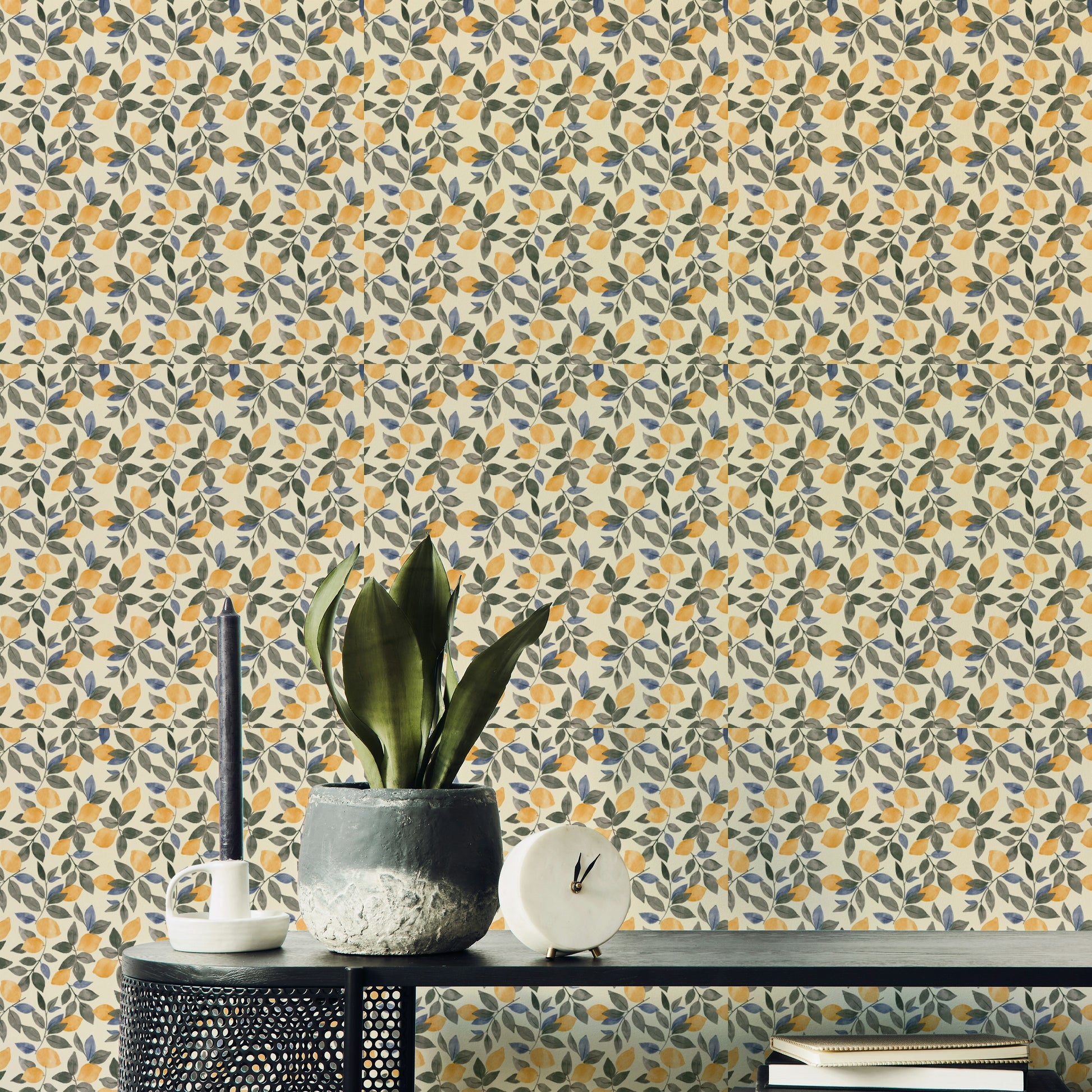 A seamless pattern of lemons and leaves.


