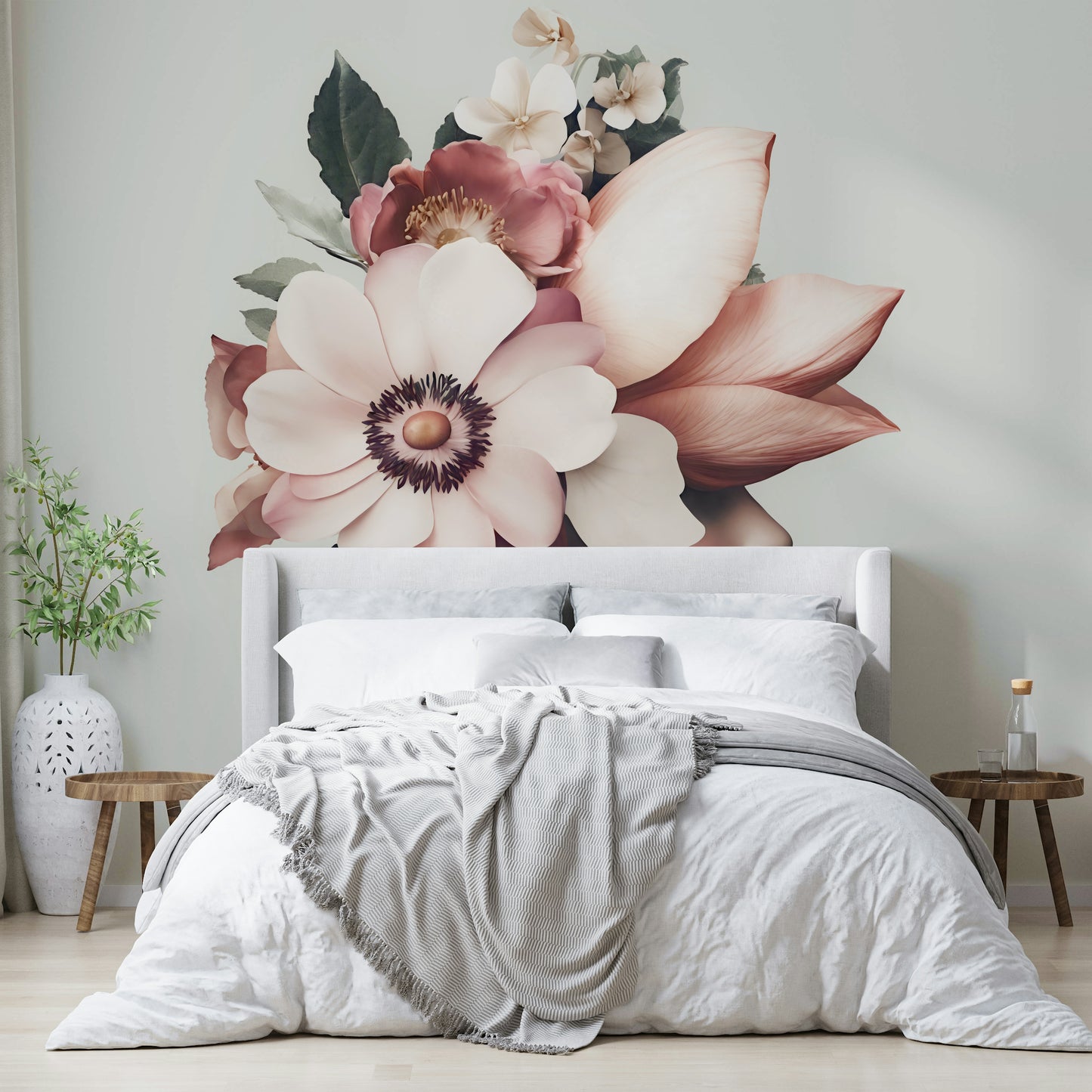 The flowers are in soft, pale blush pink and cream colors.
