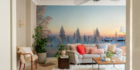 A wide shot of a wall mural showing a snowy forest at sunrise.
