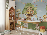 The design features a charming treehouse nestled in a forest.

