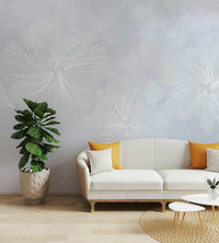 A peaceful wall mural with a floral pattern.


