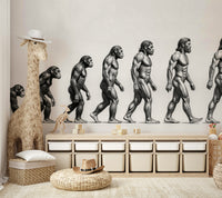 The design features figures in a line, showing stages of human development.

