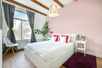 The design features a repeating pattern of soft, overlapping scale shapes.

