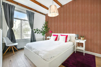 The colors are gentle and warm, with a neutral, beige and brown palette.

