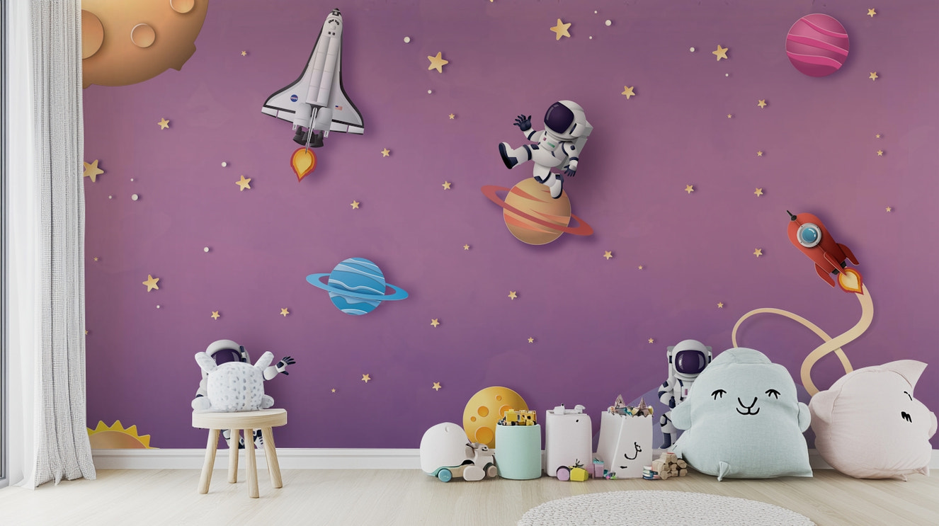 A cheerful wall mural with a whimsical, space design.

