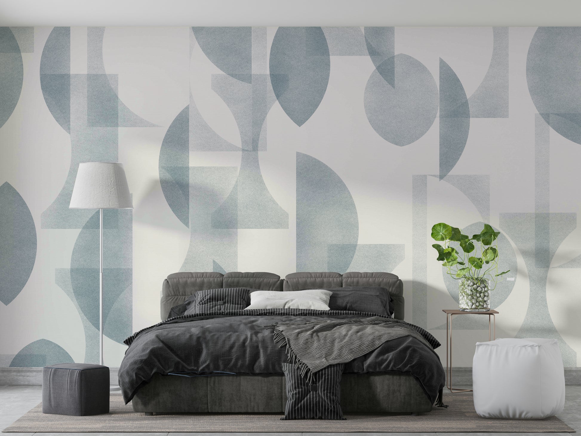 An angled shot of a wall with blue wallpaper

