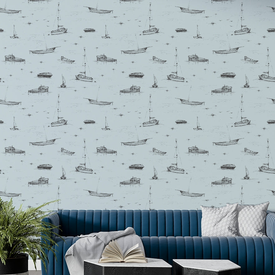 A full-wall mural showing a pattern of sketched boats.
