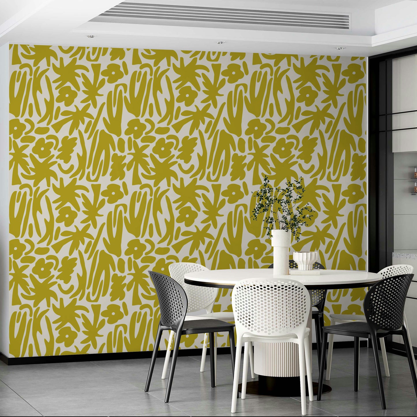 A kitchen decorated with bright yellow wallpaper

