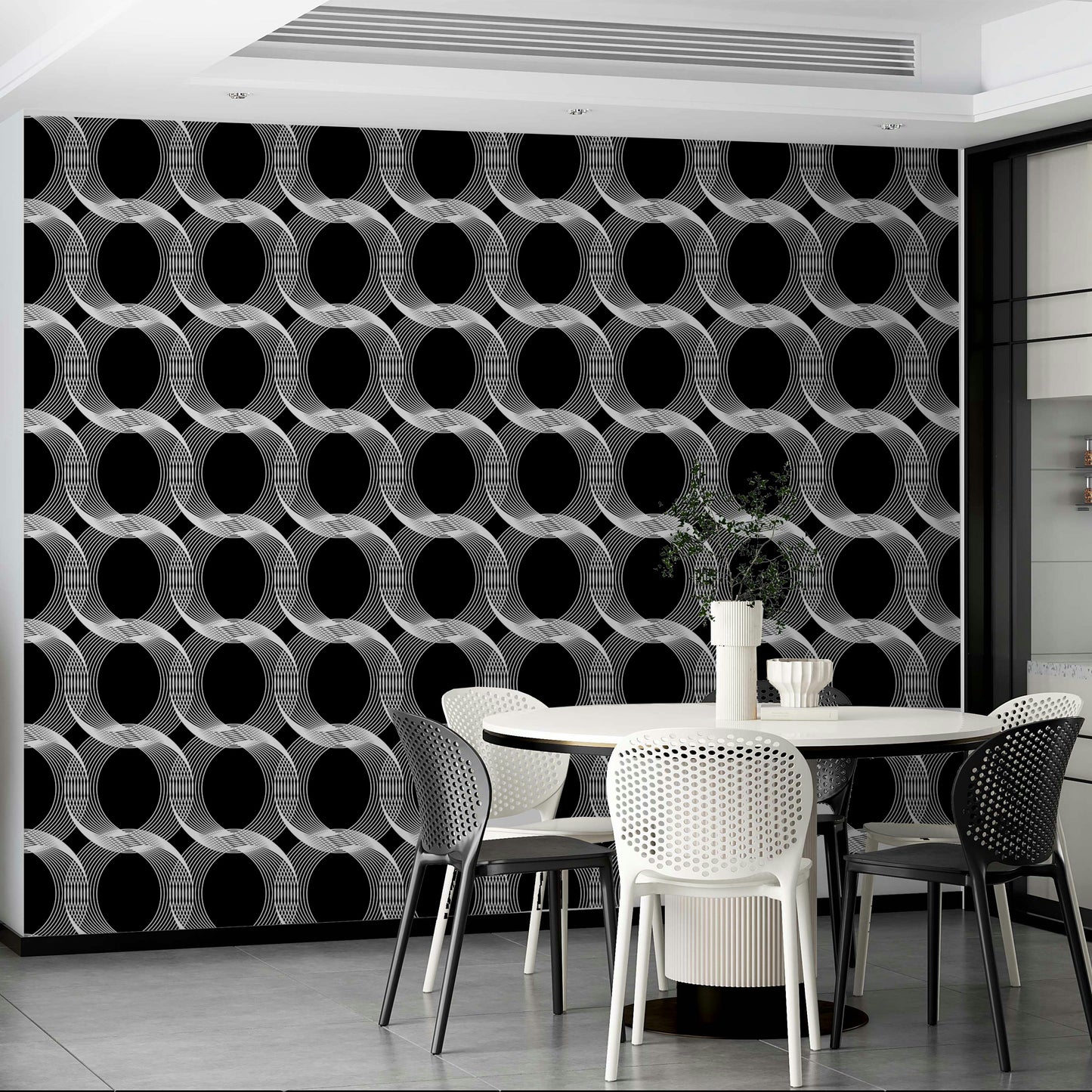 Wallpaper with a black and white repeating circles design

