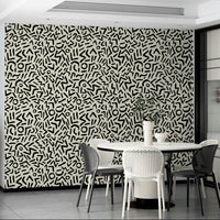 An interior with a fun and artistic accent wall

