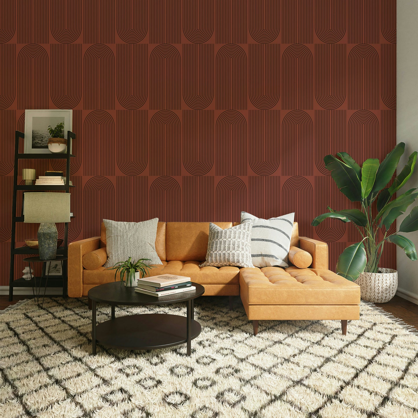 A bedroom decorated with a geometric wallpaper

