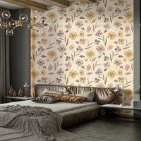 A living room decorated with a floral wallpaper


