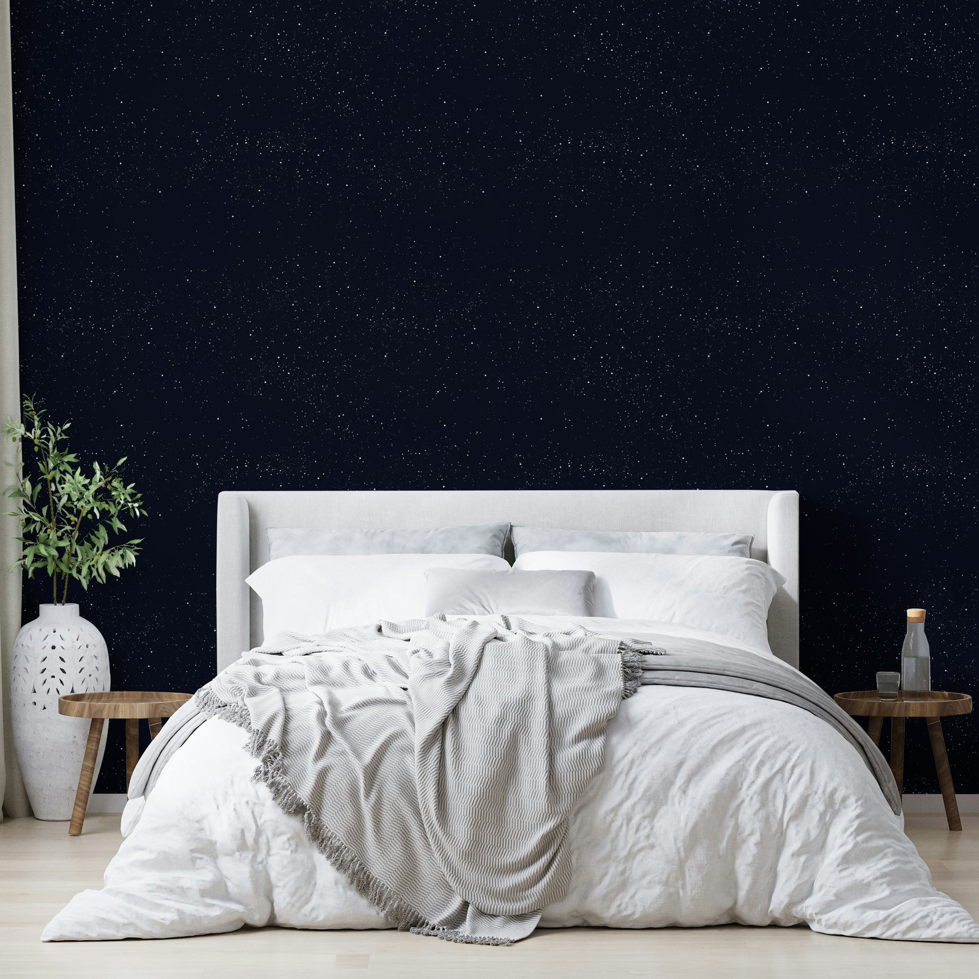 A seamless pattern of stars and nebulae on a wall

