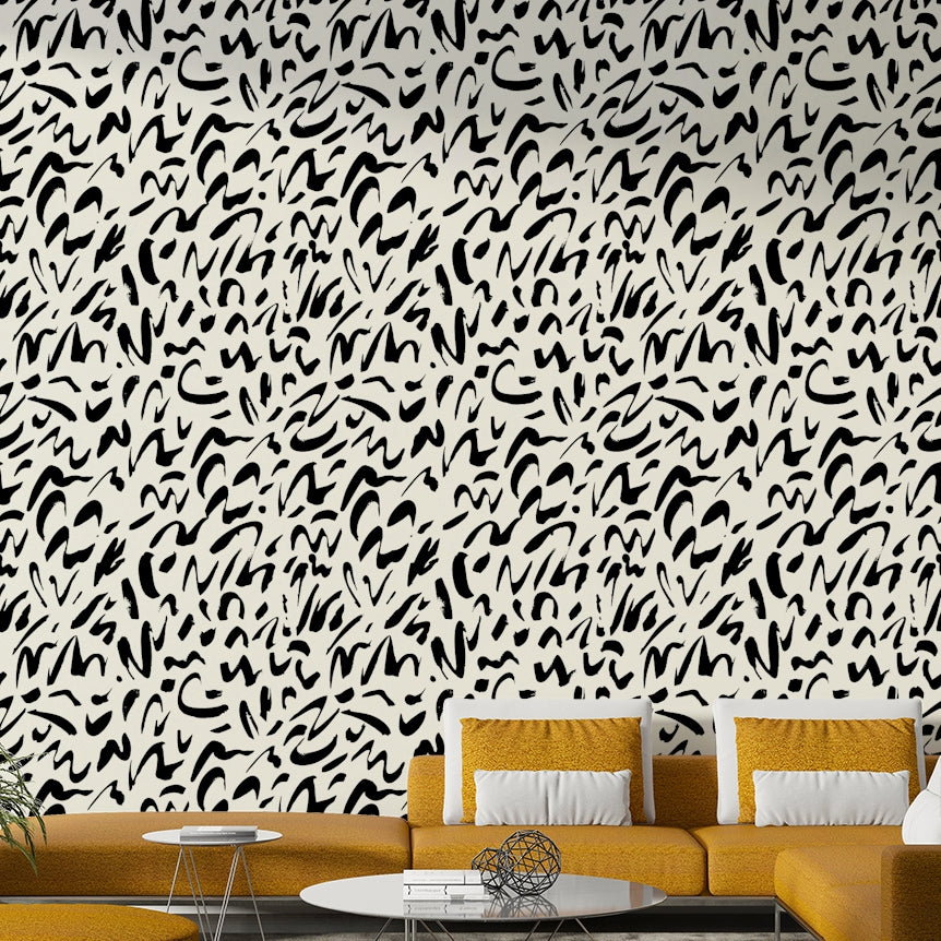 An interior with a fun and artistic accent wall

